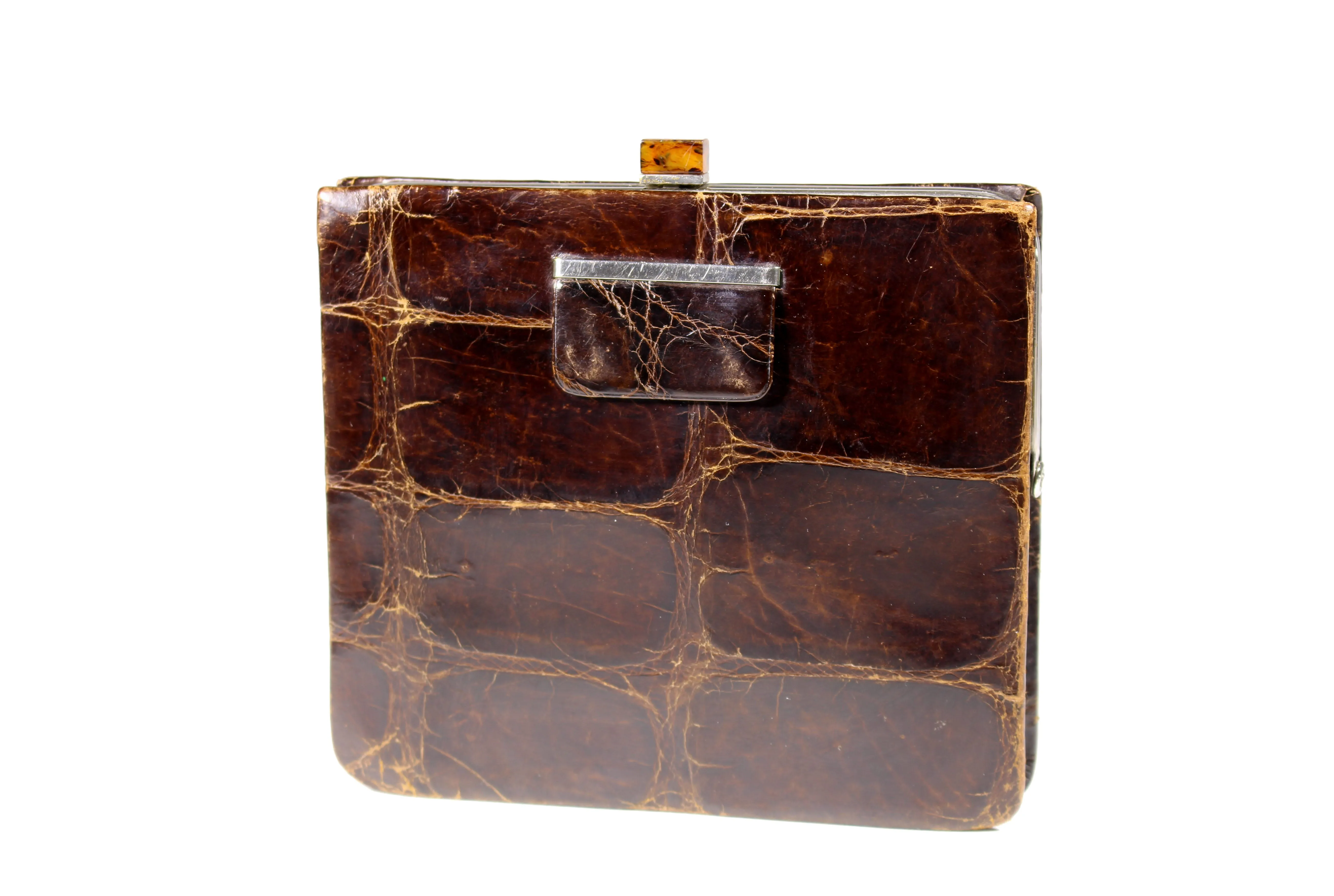 Art deco clutch in brown crocodile skin and bakelite clasp