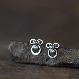 Tiny unusual artisan stud earrings, abstract silver shapes